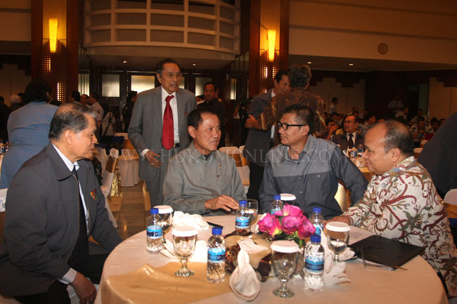 Menkumham Amir Syamsuddin (kedua kiri) dalam pembukaan seminar nasional bertajuk, “Setengah Abad Sistem Pemasyarakatan”  di, Gedung Kementerian Hukum dan HAM, Rabu (12/3). Foto: RES