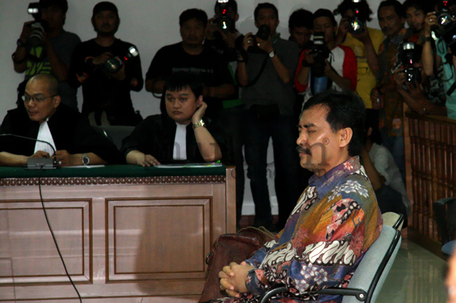 Mantan Menpora Andi Mallarangeng saat menghadiri sidang pembacaan putusan terhadap dirinya di Pengadilan Tipikor, Jakarta, Jumat (18/7). Foto: RES. 