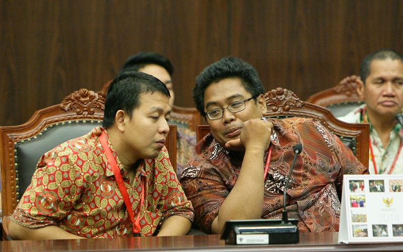 Pemohon Prinsipal (kiri) Gunawan hadir dalam sidang pengucapan putusan perkara pengujian UU Pangan, Rabu (3/12). Foto: Humas MK