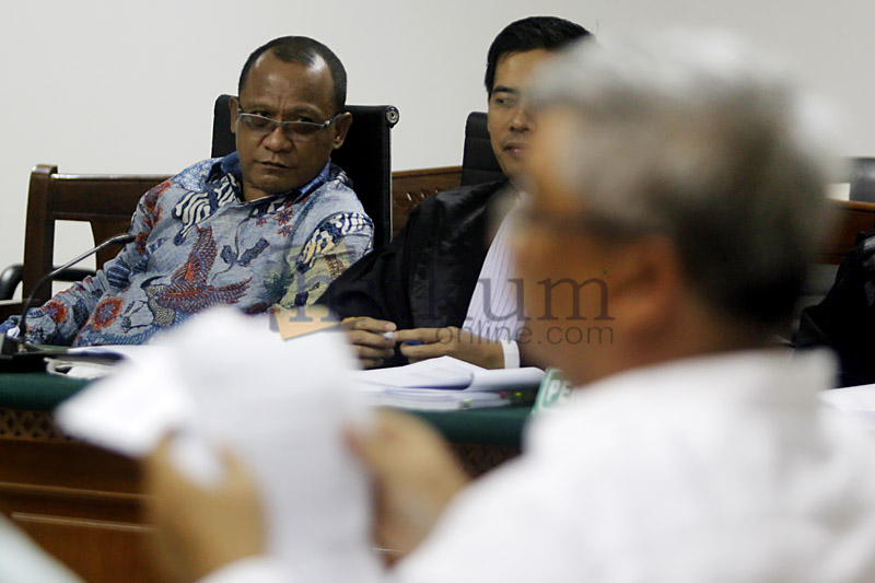 Mantan Ketua MK, Akil Mochtar dalam sidang  dengan terdakwa Bupati Morotai nonaktif Rusli Sibua. Foto: RES