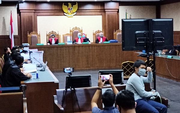 Suasana persidangan secara telekonferensi tiga terdakwa kasus Jiwasraya, Rabu (23/9). Foto: AJI