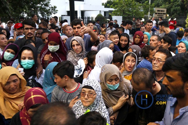 Suasana pemindahan ratusan pengungsi dari Afghanistan, Pakistan, Sudan, dan Somalia di Jakarta pada Juli 2019 lalu. Foto: RES