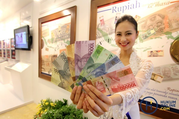 Ilustrasi penggunaan rupiah. Foto: RES