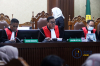 Sidang Perdana Lima Terdakwa Kasus Korupsi Minyak Goreng 4.jpg