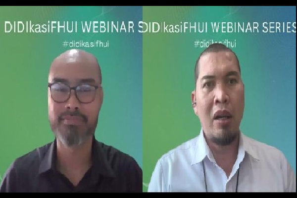 Partner IP & Entertainment Practice at Assegaf Hamzah & Partner, Ari Juliano Gema, dan Kepala Satuan Digital dan Teknologi Informasi PT PLN (Persero), Wahyu Ahadi Rouzi. Foto: FNH