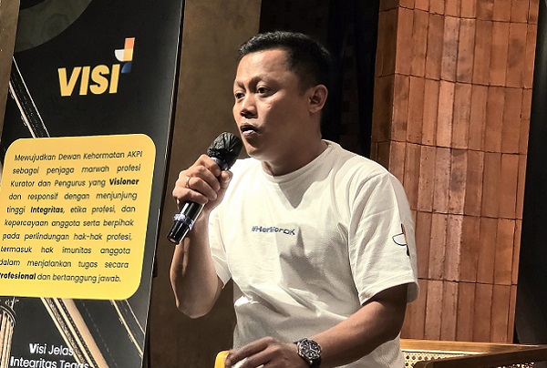 Kurator Herlin Susanto. Foto: AJI